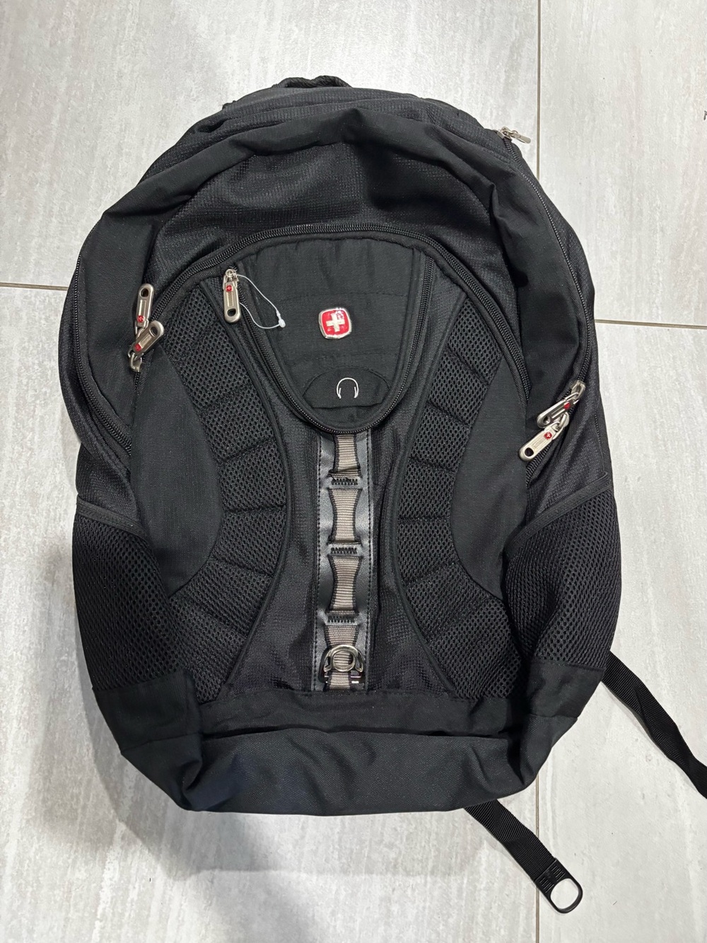 Black Backpack with Padded Back and Multiple Compartments